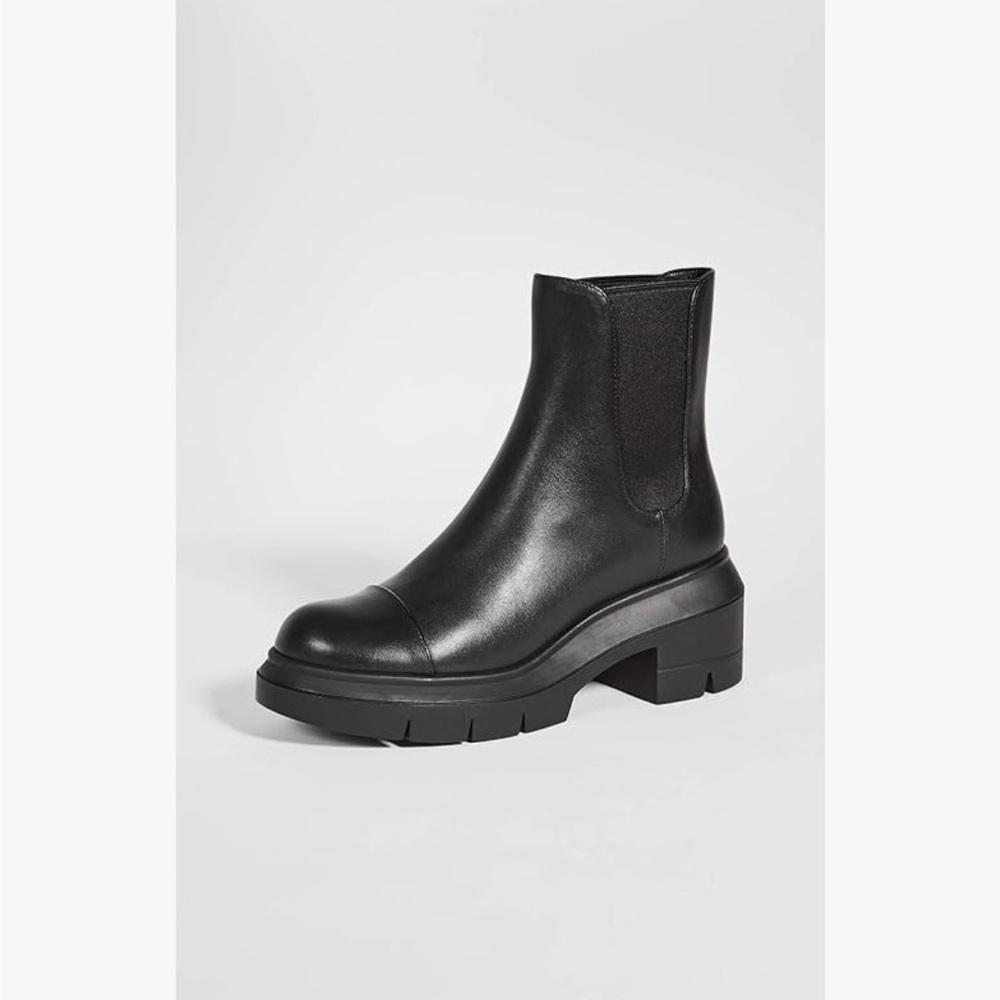 Stuart Weitzman Norah lug sole boots. Super comfy and edgy. Size 9